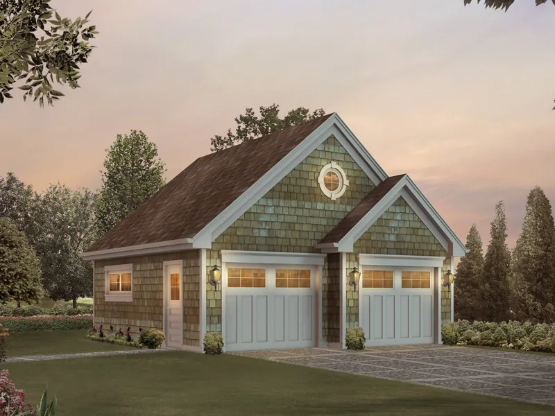 All over shingle siding makes this two-car garage with storage space a classic Cape Cod style